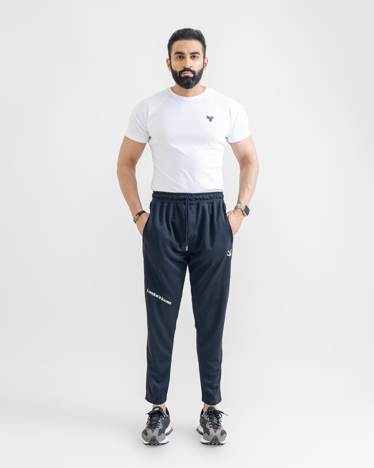 BLACK LOOSE FIT PLEATED TROUSERS