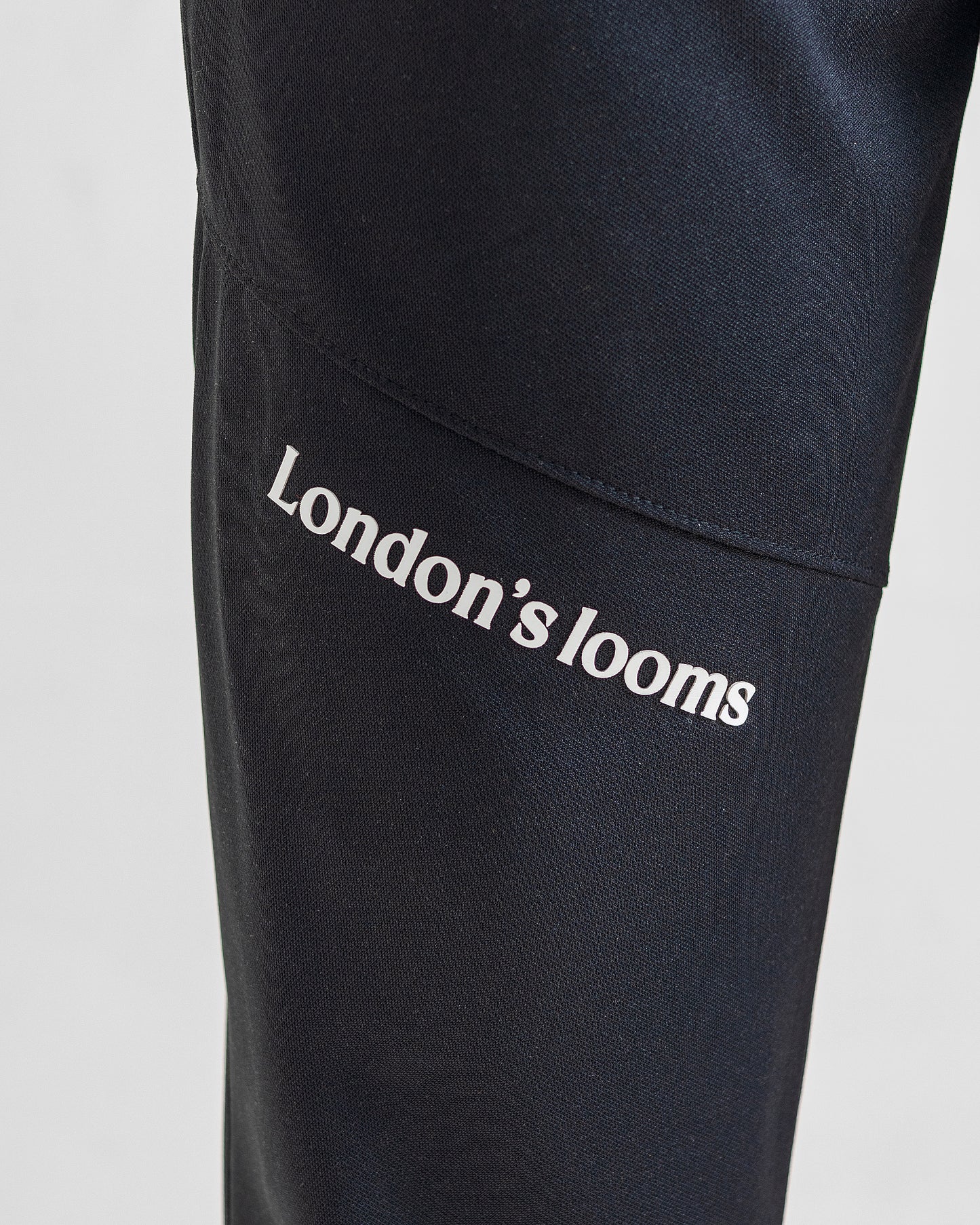 BLACK LOOSE FIT PLEATED TROUSERS